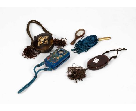 A collection of Art Deco purses and compacts including a rectangular blue Bakelite evening compact with a circular aperture a