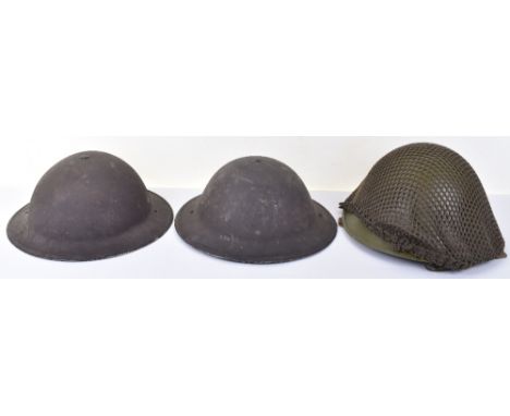 3x WW2 British Steel Combat Helmets, consisting of a fine example retaining much of the original combat paint finish to the s