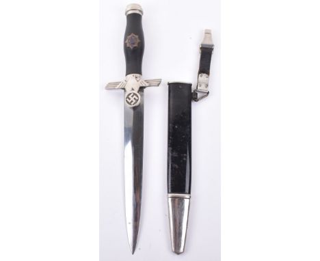 Third Reich RLB 1st Pattern Mans Dagger by Gustav Spitzer, black ebony handle with white metal and enamel RLB emblem to the c