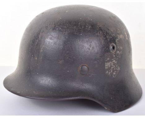 WW2 German Army M-35 Steel Combat Helmet, good untouched example of a model 35 steel combat helmet with remains of the origin