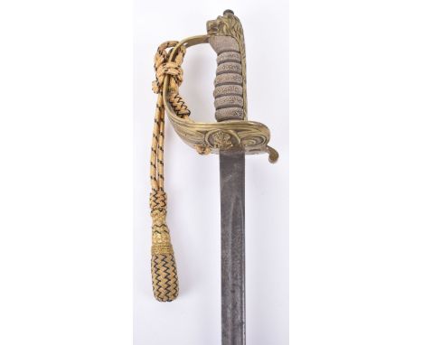 British Post 1902 Royal Navy Officers Dress Sword, with one piece half basket brass guard without folding rear section. Grip 