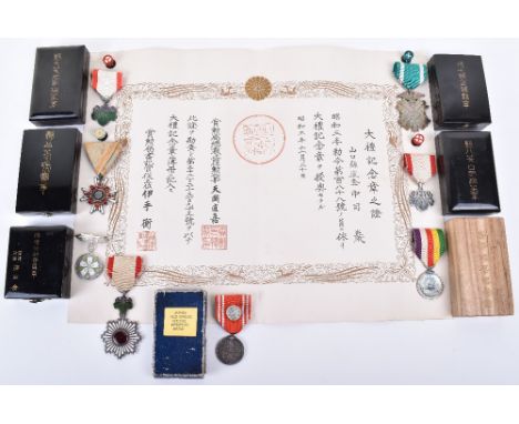 Selection of Japanese Orders and Medals, consisting of Order of the Rising Sun 5th class complete with ribbon (small area of 