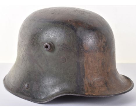 Imperial German M-17 Camouflaged Steel Combat Helmet, fine example of a standard model 17 steel combat helmet which retains m