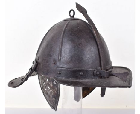 Helmet in the Style of a Cavalry Troopers ‘Dutch Pot’ c.1650, one piece skull embossed with radial ribs surmounted by an iron