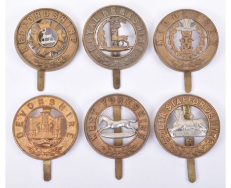 6x Other Ranks Helmet Plate Centre Pagri Badges, consisting of examples for Bedfordshire regiment, Devonshire regiment, West 
