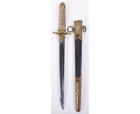 WW2 Japanese Naval Officers Dirk, with brass mounted hilt, shallow “S” shaped cross guard, floral pommel top, fish skin grip 