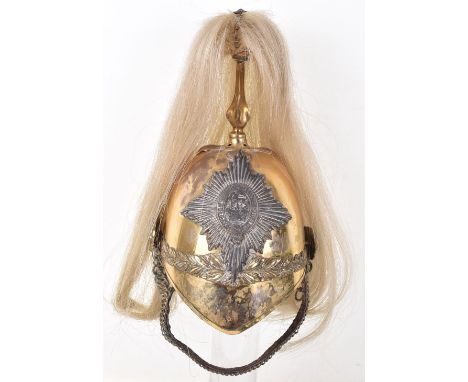 1871 Pattern 6th Dragoon Guards Officers Helmet, gilt metal shell with large silvered starburst badge to the centre having st