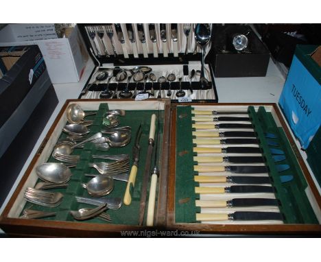 An Oak cased Canteen of Cutlery by Beeston & Co. of Sheffield, six place settings including teaspoons, ladle and Carving Set 