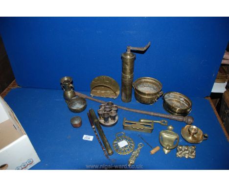 A box of Brass, copper and plated items to include door knocker, grinder, bicycle pump, chamberstick, vase, etc.