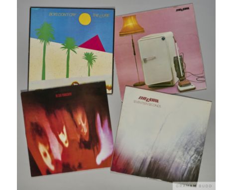 Four albums by The Cure including Three Imaginary Boys, Boys Don't Cry, Seventeen seconds and Pornography, Three imaginary Bo