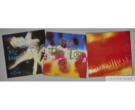 Three albums by The Cure including The Top, The Head in the Door and Kiss Me, Kiss Me, Kiss Me, all three albums have their o