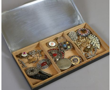 An Art Deco chrome cigarette box and collection of vintage costume jewellery including Celtic hardstone brooches and paste se