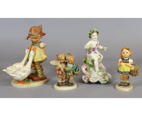 Three Hummel figures and a Sampson Chelsea figure of a putti on a neo Baroque base. 