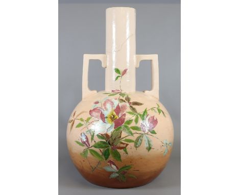 A large aesthetic movement Ault pottery twin handled vase designed by Dr Christopher Dresser salmon ground and hand painted w