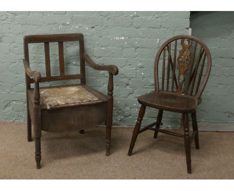 A Victorian mahogany commode along with a wheelback chair.
