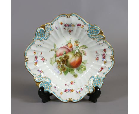 An English Sevres style dish with neo Rococo moulded border edged in gilt and turquoise enamel and printed to the centre with
