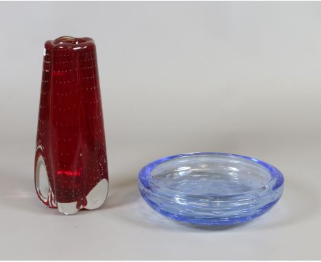 A ruby glass Whitefriars vase and a blue glass bowl both in the controlled bubble pattern.