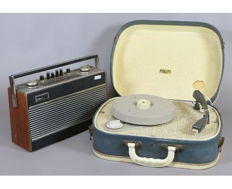 A vintage Fidelity portable record player along with a Roberts 3 waveband radio model R606 MB.