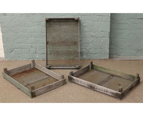 Three vintage wooden apple crates with stencilled lettering.