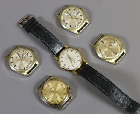 Four gentleman's vintage manual watch heads including Lucerne and another wristwatch all gold capped and with centre seconds,