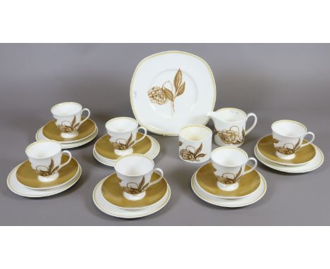 A Susie Cooper tea service decorated in the solera pattern including six trios, sandwich plate, sugar bowl and milk jug, appr