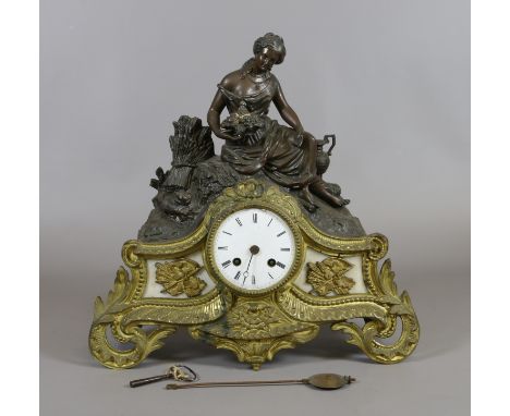 A C19th bronzed and gilt metal eight day mantel clock with alabaster panels and surmounted with a maiden striking on a bell.