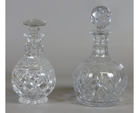 A Royal Doulton cut crystal decanter and stopper along with a smaller decanter.