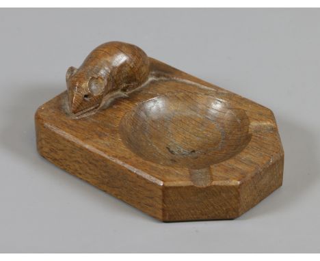 A Robert Mouseman Thompson carved oak ash tray.