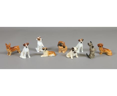 Nine Royal Doulton K series models of dogs, various breeds.