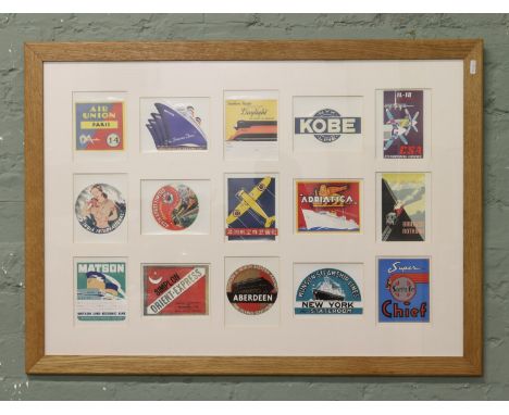 A framed collection of 15 vintage style air line ocean line and railway stickers.