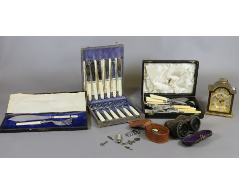 A group of collectables including a brass Swiss mantel clock, cased silver plate cutlery, cased pair of field binoculars, pen