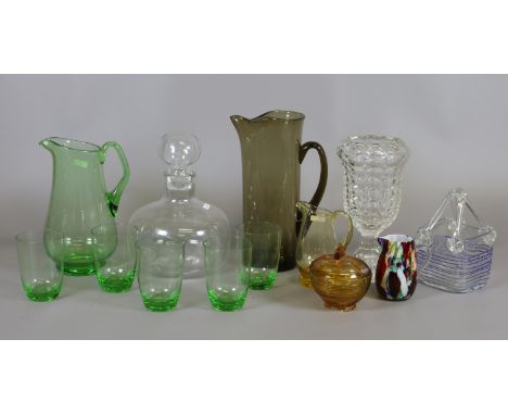 A collection of glassware to include Whitefriars style jug, studio glass style pieces, decanter, coloured lemonade set etc.