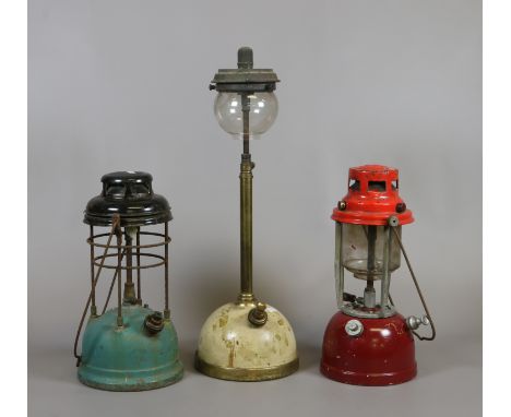 Two vintage tilly lamps and a parafin lamp.