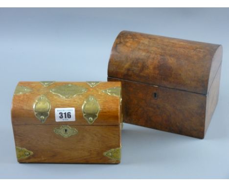 A 19th Century walnut dome topped tea caddy with twin lidded interior compartments, 15 x 18 cms along with a later oak dome t