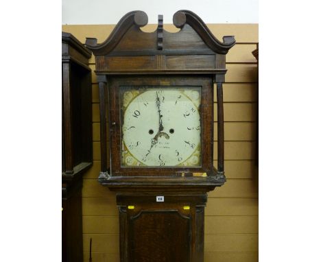 An early 19th Century oak longcase clock, the 13 ins painted dial with date aperture, maker H Hughes, Caernarfon, set before 