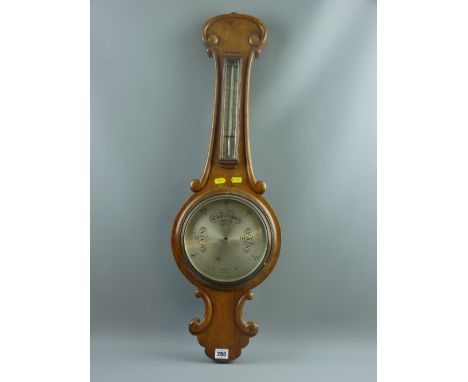 A 20th Century oak banjo shaped barometer with thermometer, the silvered gauge marked 'A Franks Ltd, Opticians, Manchester', 