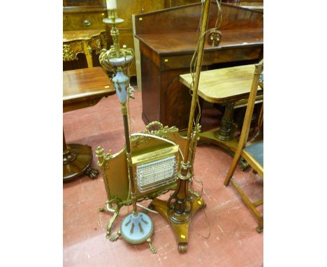 A Victorian rosewood polescreen converted to a standard lamp, a gilt metal standard lamp with Jasperware style base and cap a