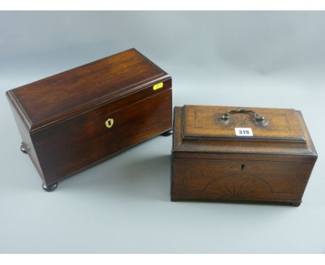 A Victorian rosewood tea caddy with shield shaped ivory escutcheon on turned bun feet, twin wooden lidded canister interior a