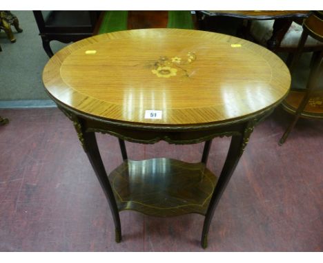 A French Kingwood style side table with gilt metal mounts and inlaid oval top and shaped rosewood under tier shelf, 74 cms hi