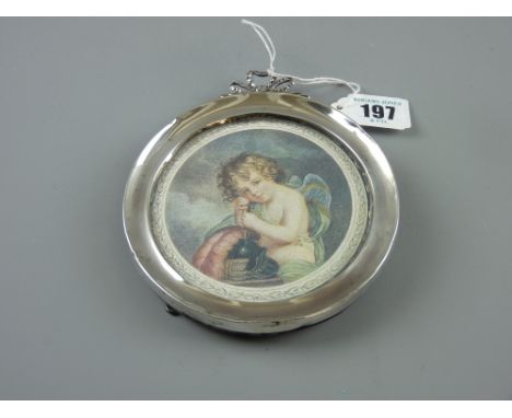 A circular silver easel portrait frame, 9.5 cms diameter with ribbon top, Birmingham 1906