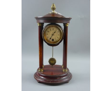 A French stained walnut circular four pillar mantel clock with cast brass pineapple finial, drum cased pendulum driven moveme