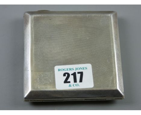 A gent's engine turned square shaped silver cigarette case, 4 ozs, Birmingham 1902