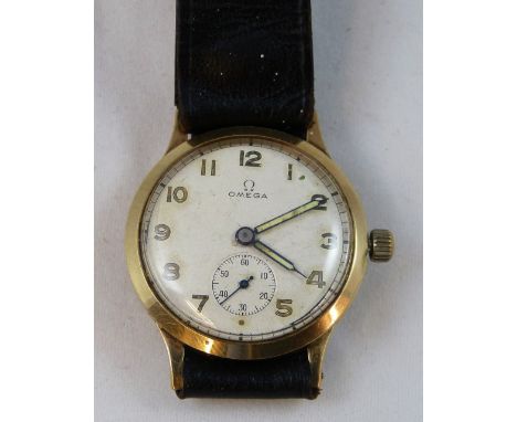 Omega - a 9 ct gold manual wind wristwatch, London 1959, the silvered dial with Arabic numerals, subsidiary seconds dial, the