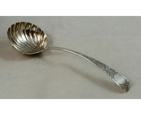A George III Irish silver ladle, by Michael Keating, Dublin c. 1780, maker, Hibernia and Harp only,  with floral engraved han