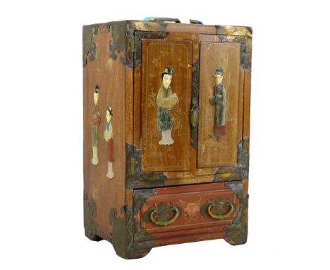 A Japanese hardwood table cabinet, with chased brass mounts and shibayama style inlaid decoration of figures in bone, mother-