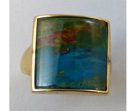 A 9 ct gold dress ring, collet set with polished rough opal, size Q, weight 8.5 grams.