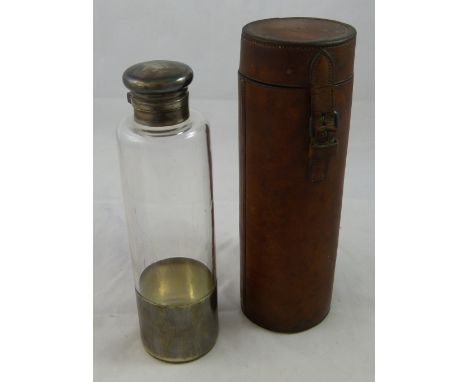 A Victorian silver mounted glass hunting flask, London 1891, retailed by Merry, St. James St., the plain glass flask with an 