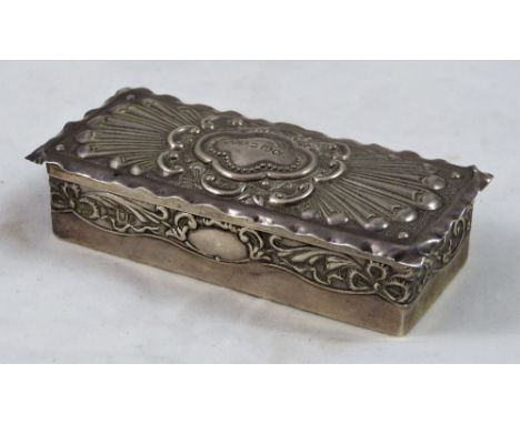 A Victorian silver trinket box, London 1901, of rectangular form with embossed decoration, 10 x 4.5 x 2.5 cm, weight 2 oz.