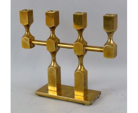 A Swedish brass four-light candelabra, designed by Lars Bergsten for Gusum and dated 1983, as a single row of four block and 
