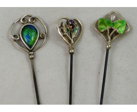 Charles Horner, Chester - an Art Nouveau silver and enamel hat pin, 1905, of scroll design, a  enamel and amethyst glass this